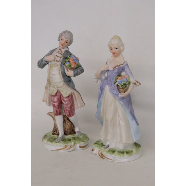 This gorgeous Pair of 2 Figurines are made of porcelain. These beautiful pieces depict a Rococo revival style couple in...