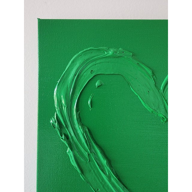 Bright spring green heart that measures 12"X12". *Please note, colors may vary per screen.