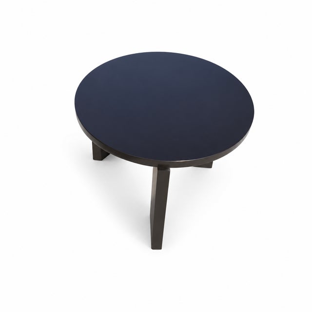 Modern mid century style end table. Table is made of alder with a dark expresso finish. Table has a unique look and feel....
