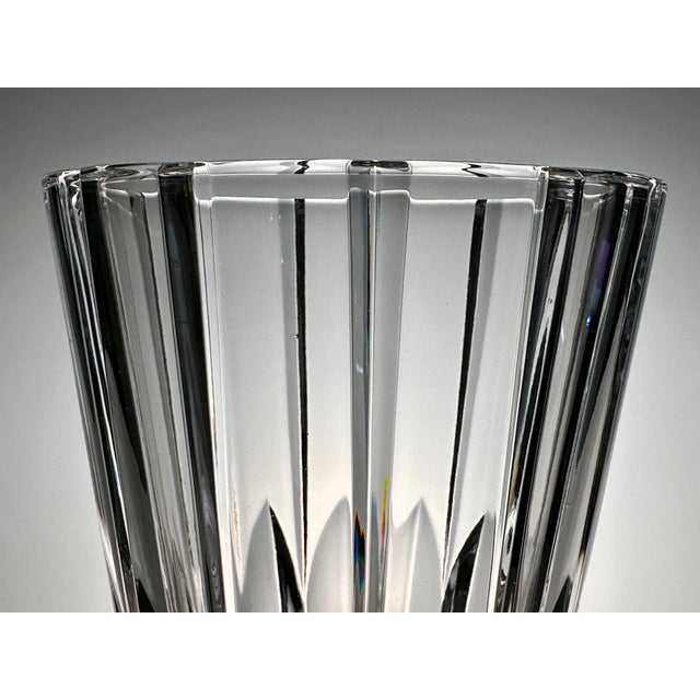 High-quality vase made of solid, clear crystal, likely from Rogaska Kristal, formerly Yugoslavia. The heavy, geometrically...