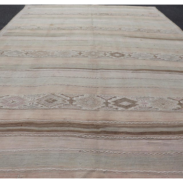 Measures: 6'1 x 11 Vintage Turkish Kilim with Soft Sage, Sand, Taupe, and Subtle Geometrics. Keivan Woven Arts /...