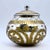 Perfect for creating a fun, festive atmosphere on any shelf, console, or mantel, this covered vessel updates a classic...