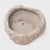 This stone basin was carved by hand over two centuries ago, sculpted from solid limestone with and irregular texture and...