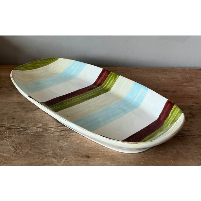 A vintage VIETRI glazed ceramic serving tray, showcasing the brand’s renowned Italian artistry and meticulous attention to...