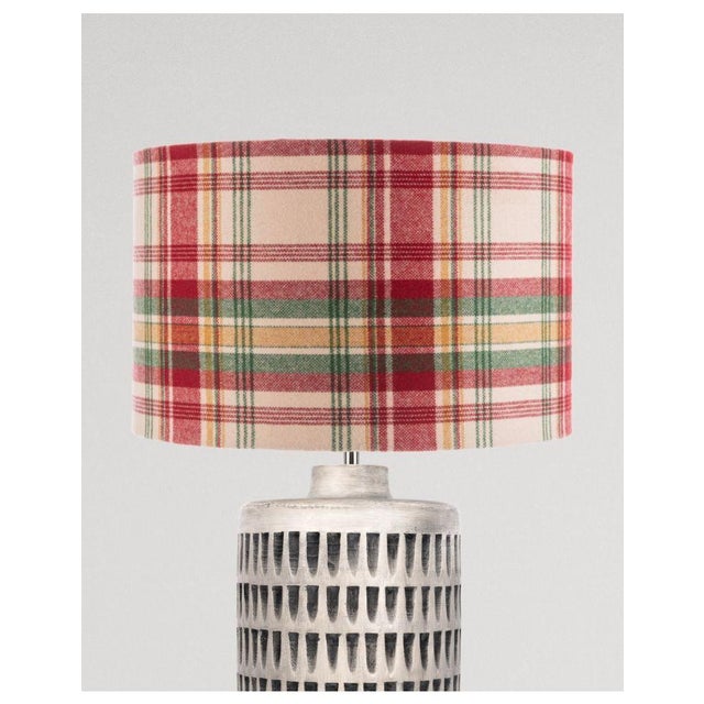 Named after the county in which the 1969 Woodstock Festival took place, this bold check makes a statement, emulating the...