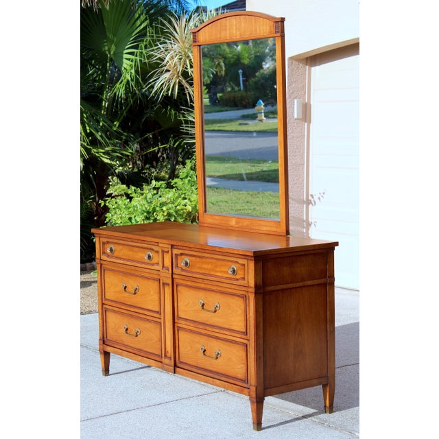 This authentic mid-century modern Drexel mahogany lowboy dresser is a standout example of vintage American furniture...