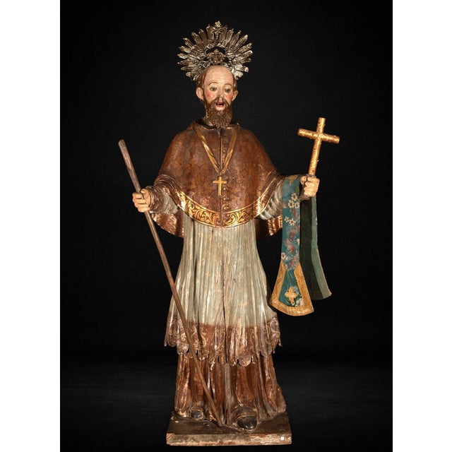A finely carved and polychromed wooden figure depicting Saint Francis Xavier, attributed to the Mexican Colonial School...