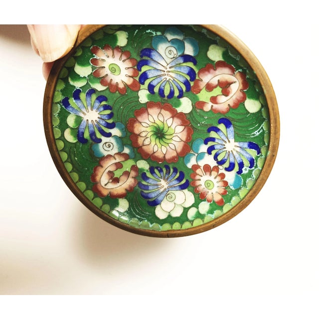 This charming Antique Miniature Multicolor Floral Cloisonné Dresser Dish is a delightful example of the intricate...