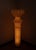 A sculptural floor lamp exploring the relationship between material, structure and light. When unlit, Lamp N.01 reads as a...