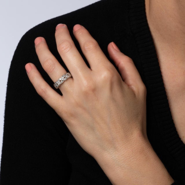 Elegant vintage Art Deco era ring (circa 1920s), crafted in 900 platinum. Single cut diamonds total an estimated 0.65...