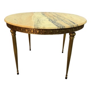 Mid-Century Marble Center Table with Decorated Brass Frame and Legs attributed to Maison Jansen, France, 1950s For Sale