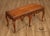 High Quality Bench Crafted In A Rococo Style With A Richly Carved Wood Frame And Curved Cabriole Legs. The Seat Is...