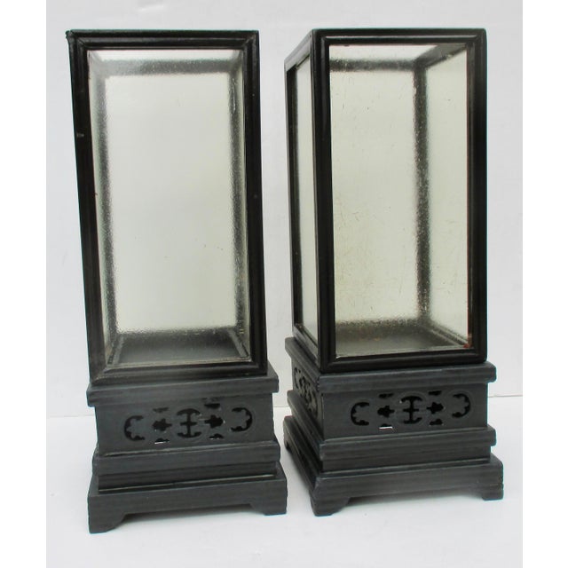 Antique Chinese( late 19th- early 20th) wood and glass pair of hurricane lanterns. Square bases and shades with glass...