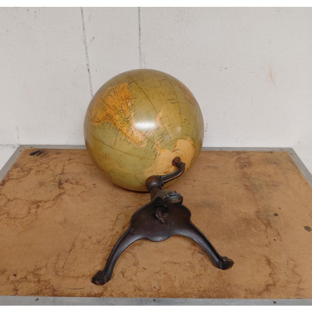 Hammond's 12" Physical Globe. It is 20" high x 12" deep and wide. Good condition with some losses and fading. Dates from...