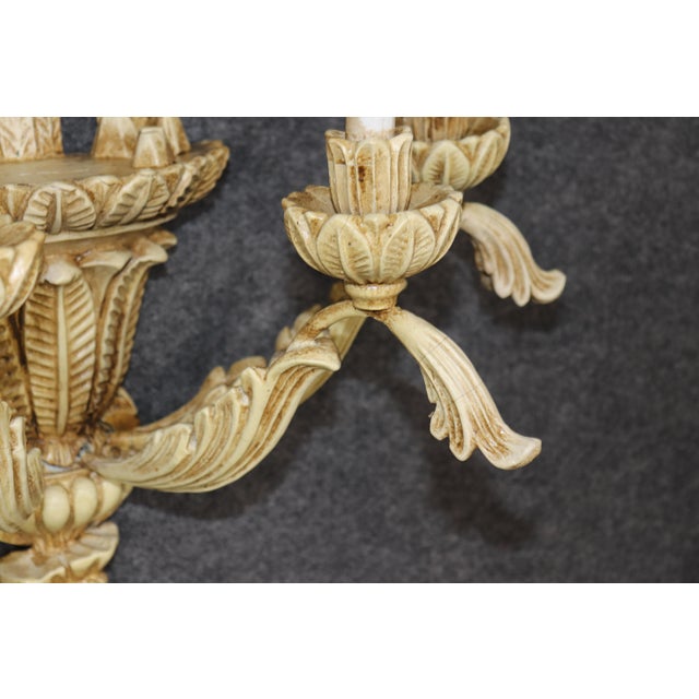 Elevate your interior with this striking pair of Serge Roche–style carved wall sconces, designed with the dramatic...