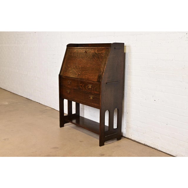 A gorgeous antique Mission or Arts & Crafts period slant front writing desk or secretary desk By Stickley Brothers USA,...