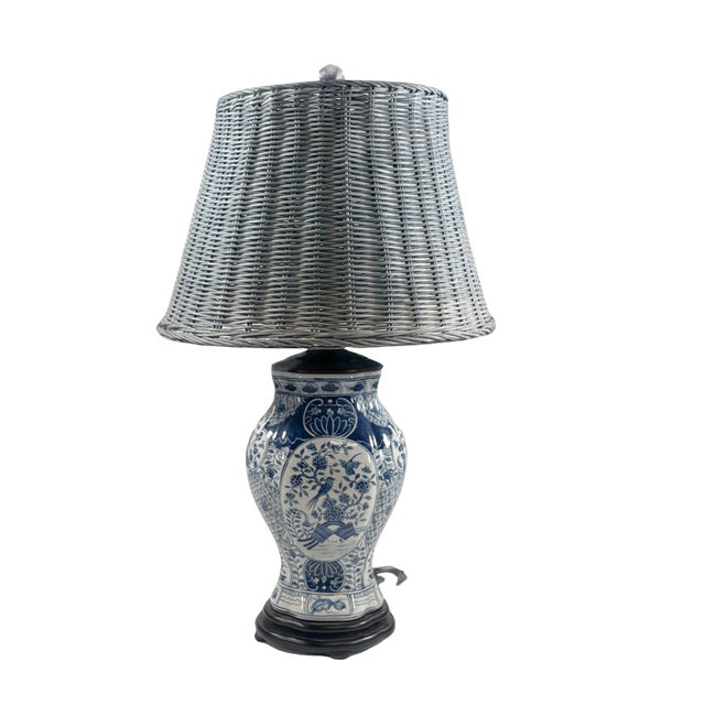 Stunning Delft style ceramic lamp depicting chinoiserie motifs. 14" to base of lamp, 8" wide by 6.5" approximately.