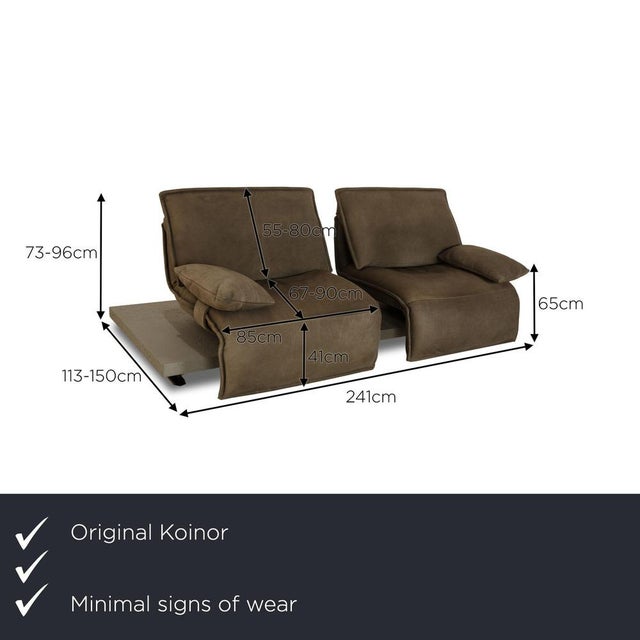 The two-seater Free Motion Edit 2 is covered in green genuine leather and stands on a base with narrow metal feet. It is...