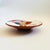 A vintage studio pottery plate. Terra cotta color to the clay with a beautiful hand painted design of a fish to the...
