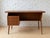 Gunnar Nielsen for Tibergaard, Denmark, 1960s Elegant Danish mid-century writing desk in warm teak. Features a single bank...