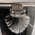 This mid 20th century ice bucket from France is finished in silver. It is banded with ribbed, horizontal detailing around...