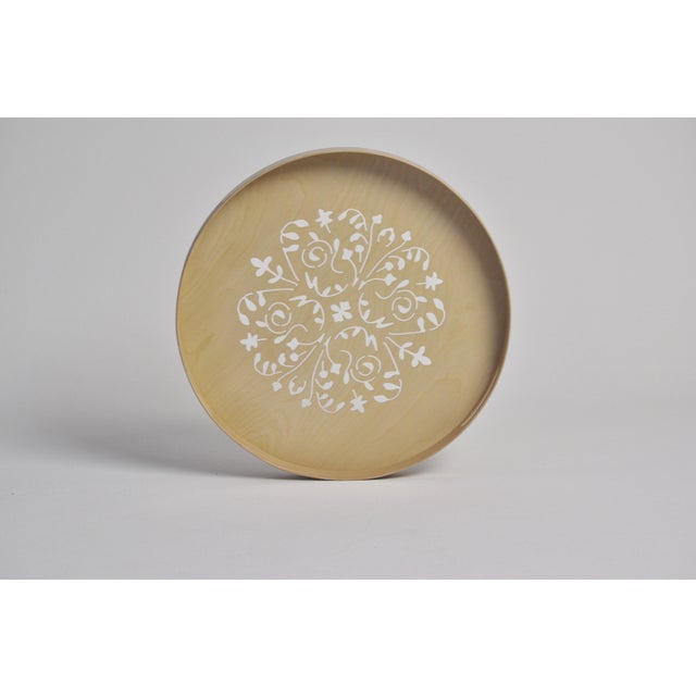 Giant wooden tray with handles, perforated with baroque motif. Made of bent beech. It can be transformed into a coffee...