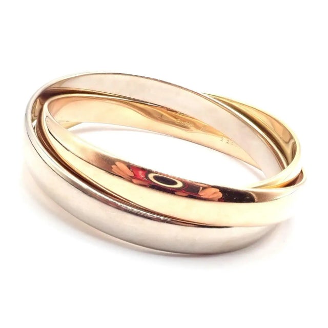 Contemporary 1990s Cartier Trinity Rolling Tricolor Gold Large Model Bangle Bracelet For Sale - Image 3 of 9