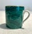 Elegant set of Mid-Century Modern porcelain espresso cups from Neiman Marcus featuring a striking malachite-inspired...