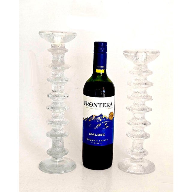 Offered are 2 Festivo model textured art glass candle holders originally designed by Timo Sarpaneva (in 1966) for Iitala....