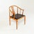 At the Cabinetmakers' Guild's Autumn Exhibition in 1943, Wegner presented his first version of a chair inspired by an old...