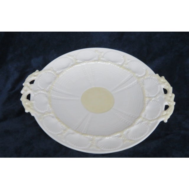 This gorgeous Plate is made out of porcelain. This lovely collectible / decorative Plate was made in Ireland by Belleek,...