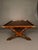 Bring classic campaign-inspired style to a living room, library, or study with this vintage mahogany coffee table, circa...