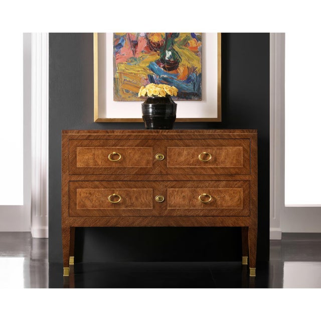 Constructed from hand-rubbed ash burl and walnut, the chest exudes a warm, natural elegance, enriched by its unique wood...