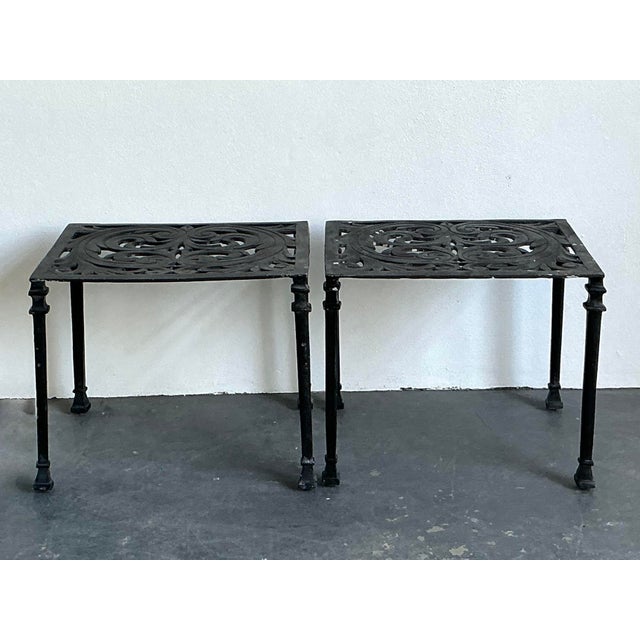 This elegant pair of vintage side tables is a beautiful showcase of traditional metalwork and Mediterranean-inspired...