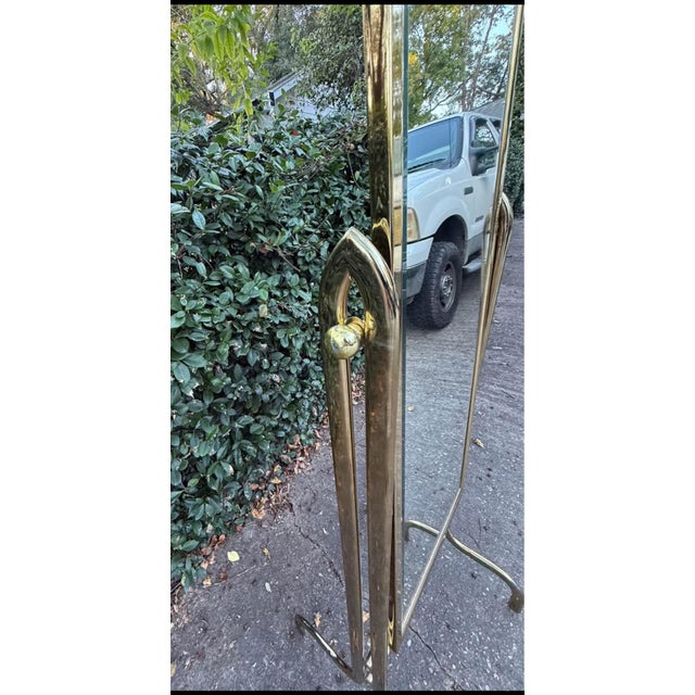 Heavy Brass tilting cheval mirror. Hollywood regency at its best. Minor imperfections