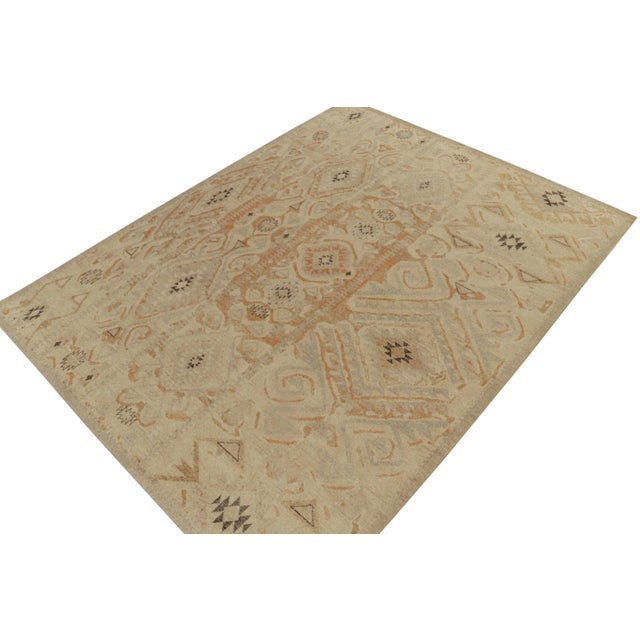 An exciting 9x12 hand-knotted wool rug from Rug & Kilim’s Homage Collection; a bold textural encyclopedia of patterns and...