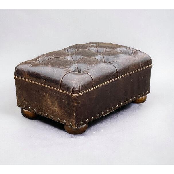 Brown Leather Foot Stool. Good quality leather, on bun feet. 70 x 50 cms, 35 cms in height Really good shape, patina on...