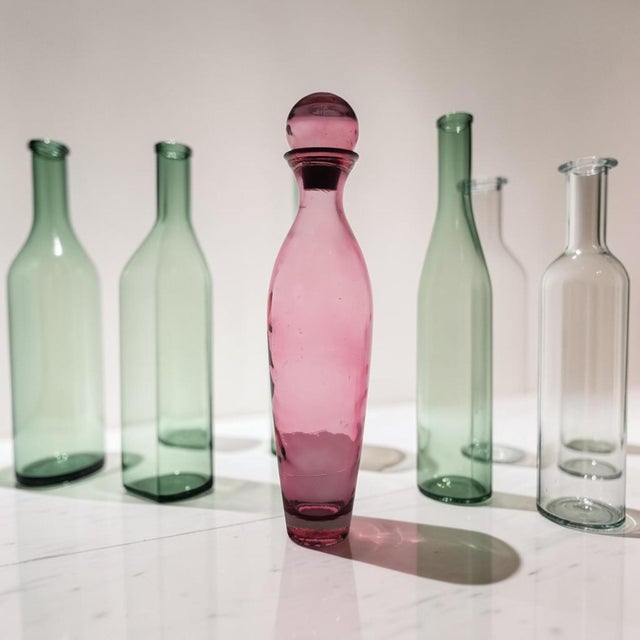 This large hand-blown genie bottle decanter was produced by Vidrios San Miguel of Spain during the late twentieth century....