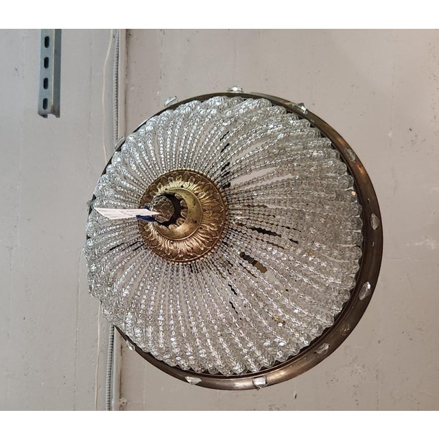 French, Brass Crystal Beaded Dome Light. It has 4 sockets for E 26 bulb. Brass frame beaded basket. Flush Mount.