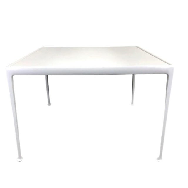 Bright white aluminum "1966 Collection" square dining table designed by Richard Schultz for Knoll. The iconic table was...