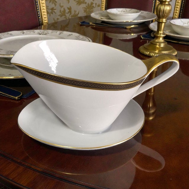 This elegant vintage Art Deco Bavaria Germany fine porcelain gilded gravy boat is a stunning piece of decorative cookware....