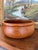 This vintage teak wood bowl was hand-turned in Thailand by Winesome, a known maker of quality teakware. Crafted from...