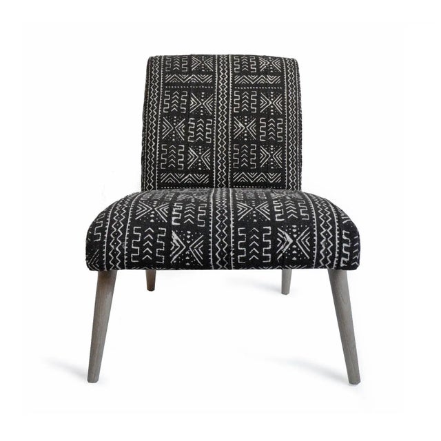 Authentic vintage black and white Mali mud cloth upholstered slipper chair. Beautiful geometric tribal patterns cover this...
