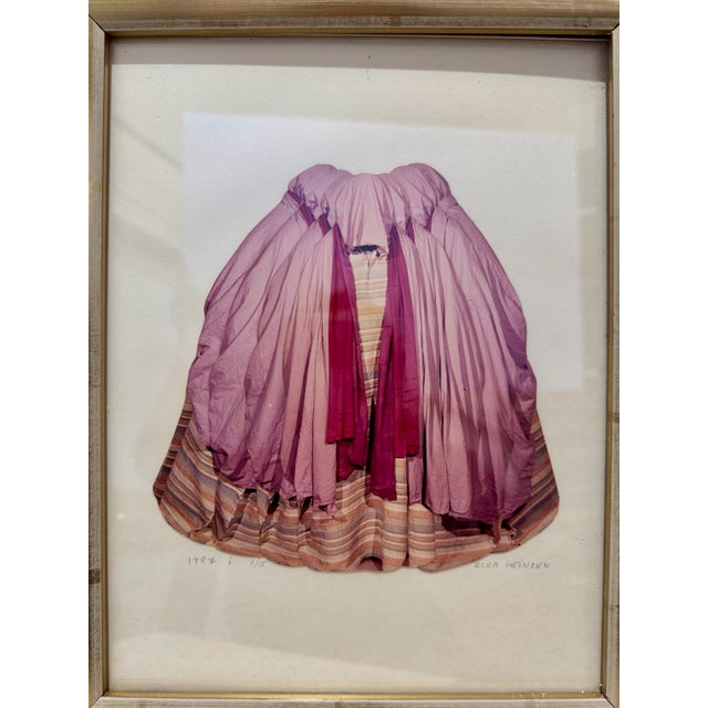Original photo-based collage by Elga Heinzen, dated 1987. The work depicts a carefully arranged garment or textile form...