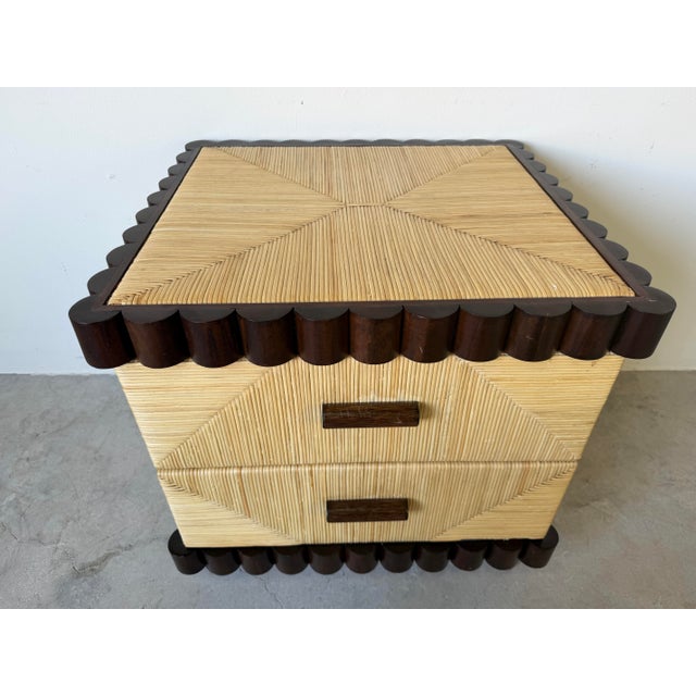 Striking and highly collectible John Hutton for Donghia nightstand featuring a sculptural scalloped mahogany frame paired...