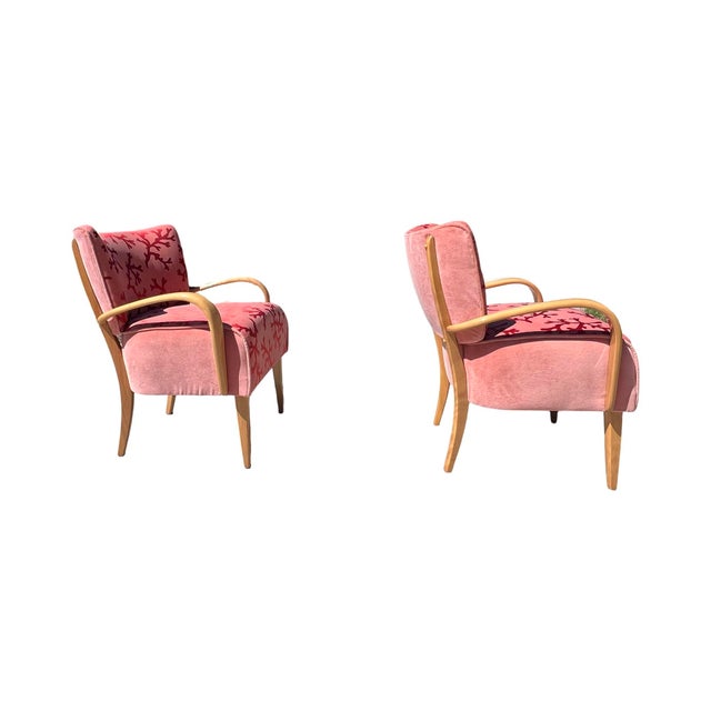 We have for your consideration a very rare pair of lounge arm chairs manufactured by heywood Wakefield furniture company....