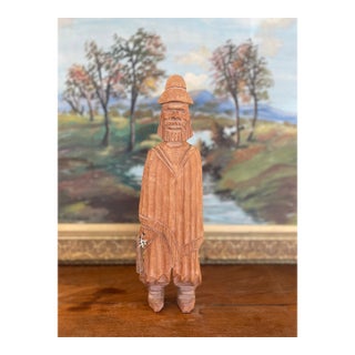 Hand-Carved Vintage Folk Art Wood Figure of Bearded Man With Hat and Carrying a Carved Object. For Sale
