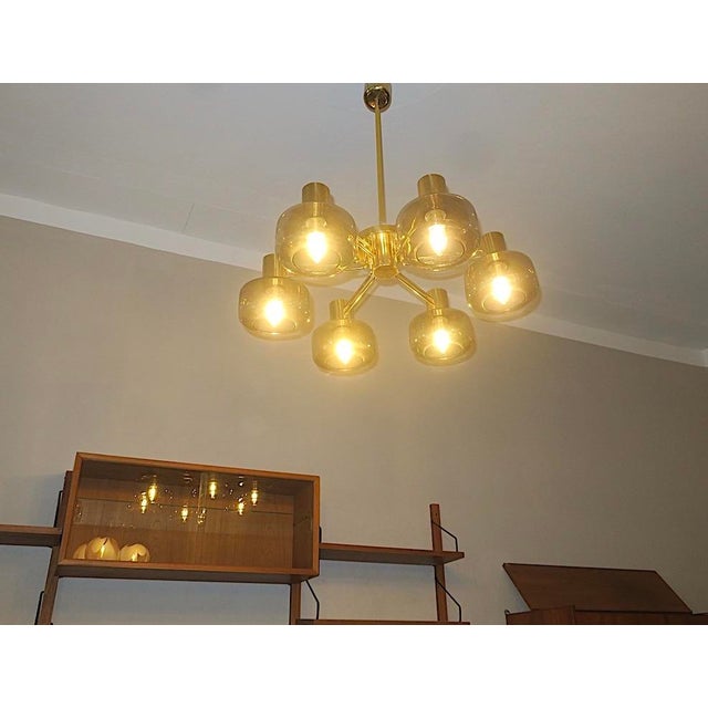 Large Brass and Glass Chandelier from Hans-Agne Jakobsson, Sweden, 1960s, in Flawless conditions. Designed 1960 to 1969 I...