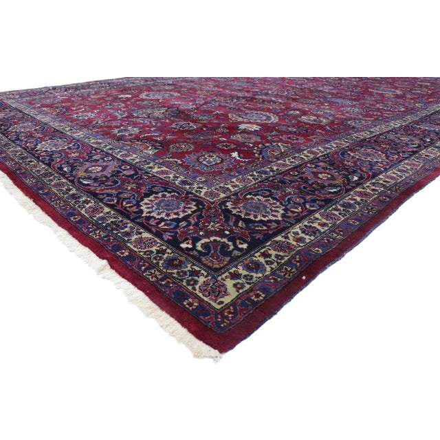 Antique Persian Mashhad Rug with Victorian Elizabethan Style 12'00 x 19'07. With its beguiling beauty and rich jewel-...