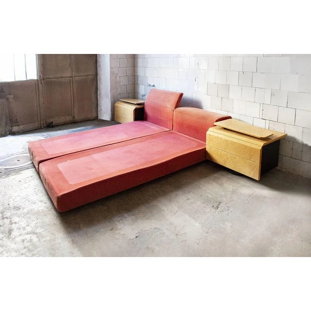 Bed covered in fabric with reclining backrest. Designer John Offredi Tasty producer 70's The bedside tables are not...